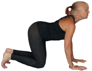 woman doing "cat strech" excercise