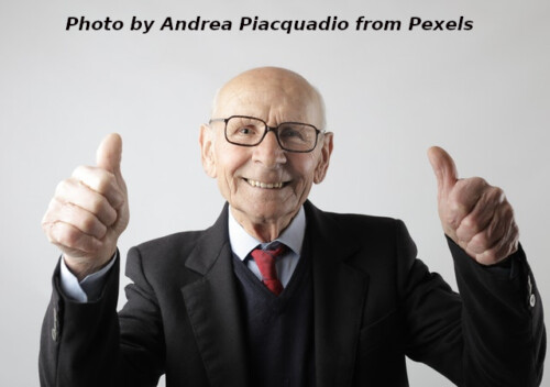 Older man with two thumbs up