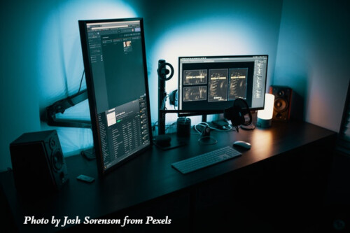 computer screens on desk
