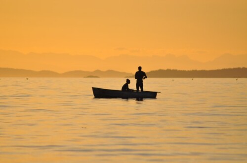 two people on rowboat
