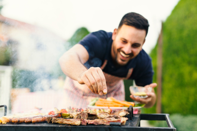 man bbqing