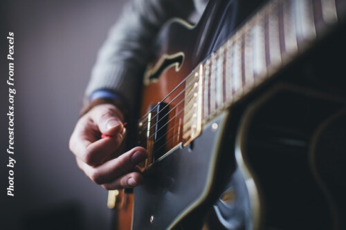 man playing guitar