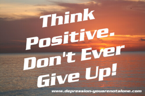 the words think positive. don't ever give up. ove ocean sunrise (copyrighted)