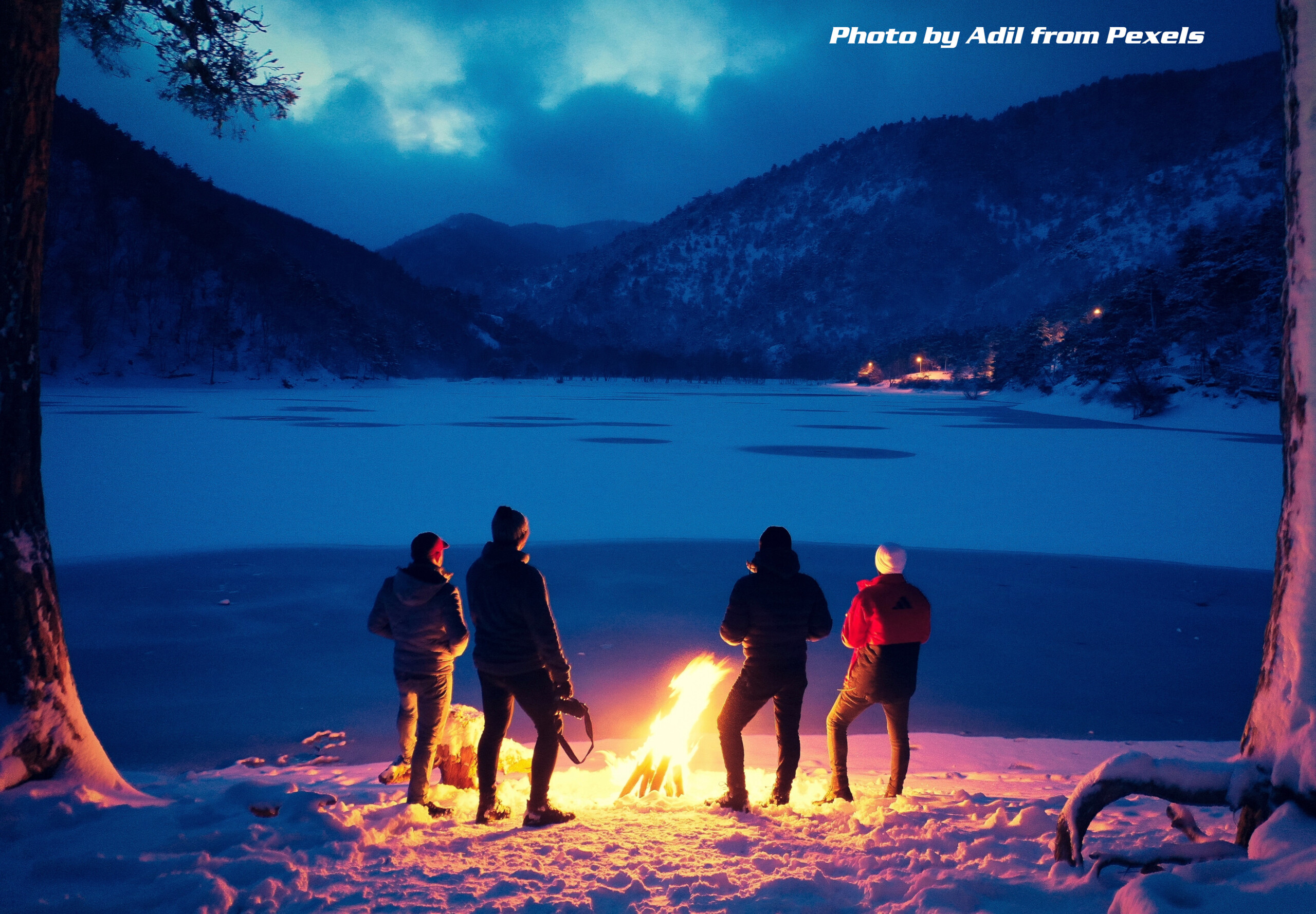 winter campfire by lake