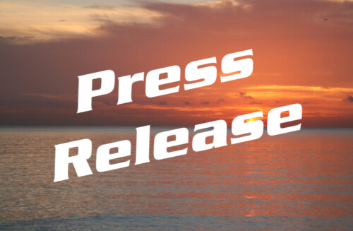 the words press release ove ocean sunrise