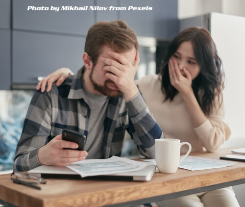 husband and wife working on finances