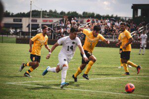 men playing soccer