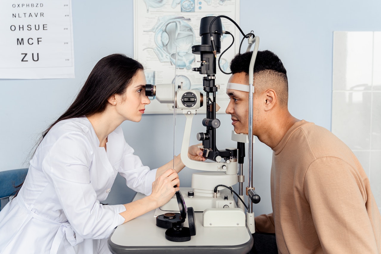 optometrist with patient