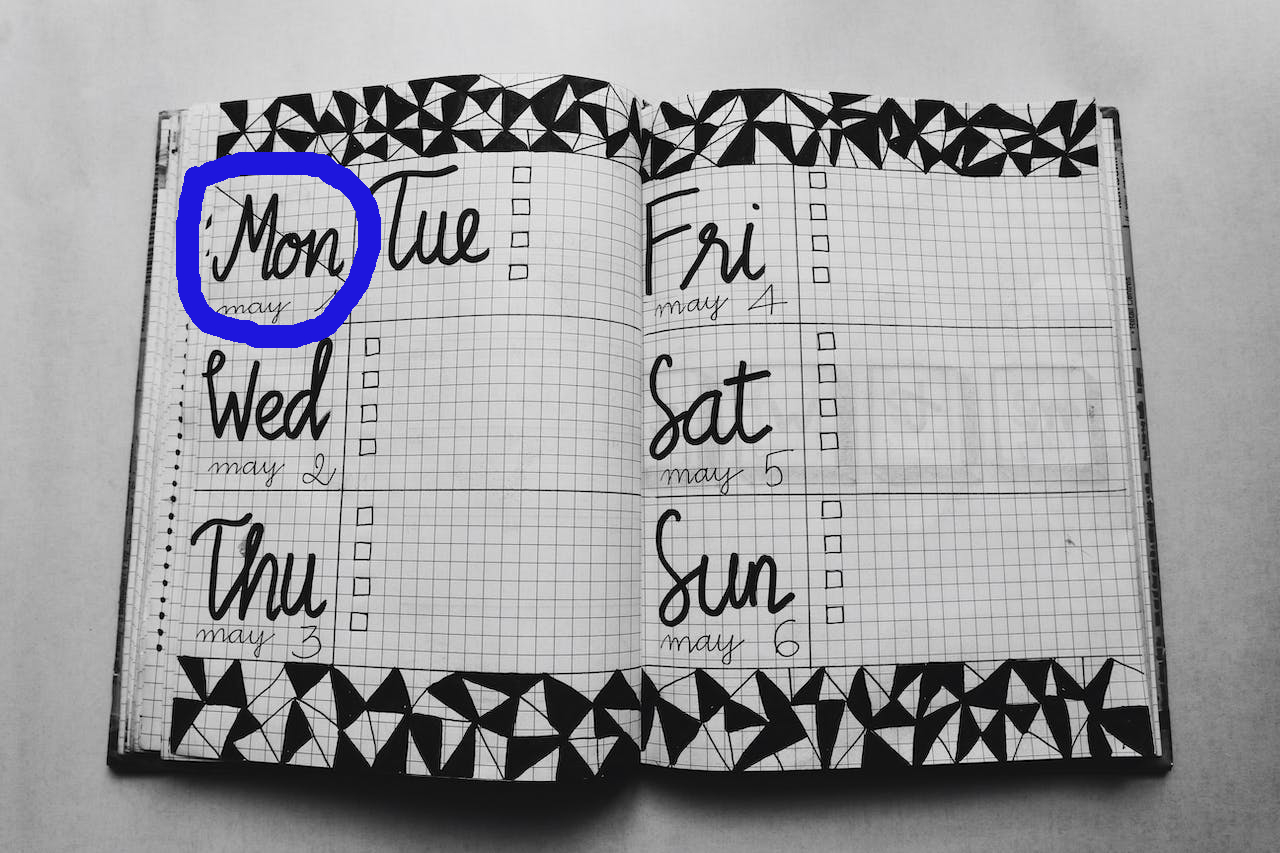 notebook with days of week